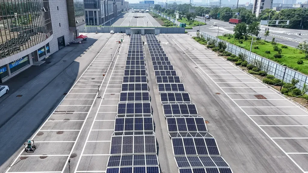 A foldable photovoltaic container is deployed at a prepared temporary industrial power location.